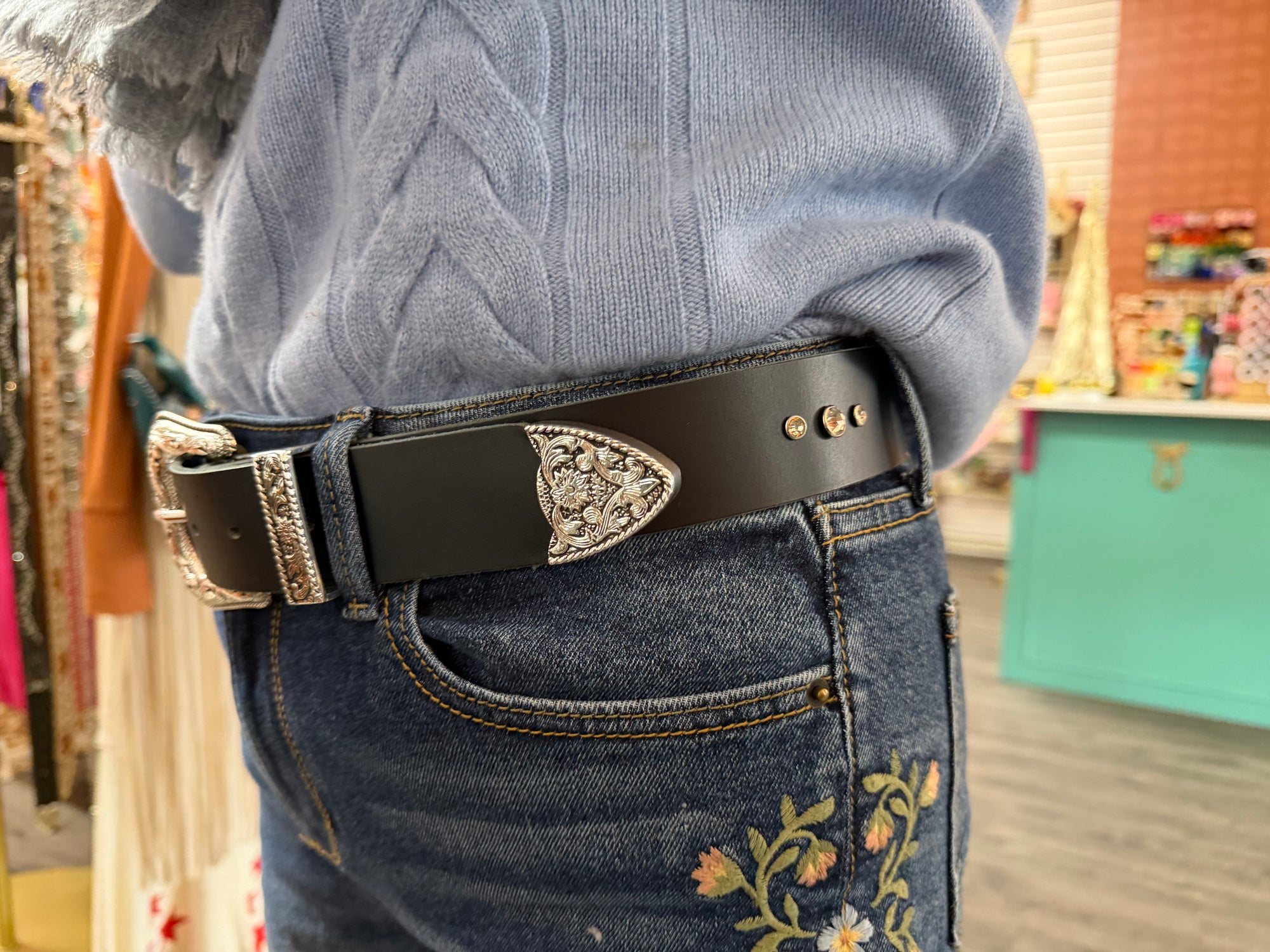 Custom leather belt with Western buckle at Bullet Boots Belt Bar in Denville NJ luxury custom belt bar experience for bachelorette parties corporate events and private group bookings handcrafted western leather accessories
